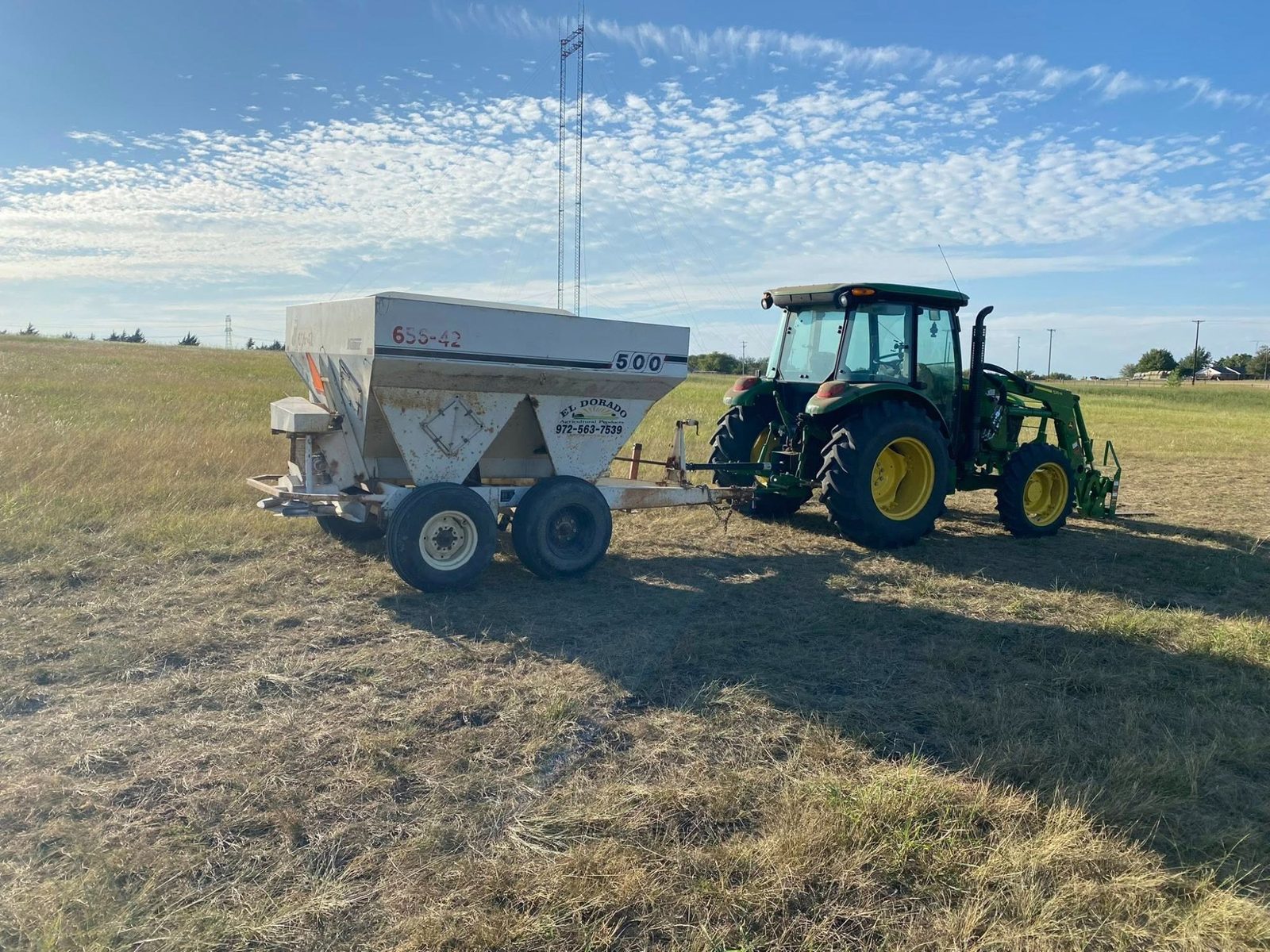 Tractor with spreader
